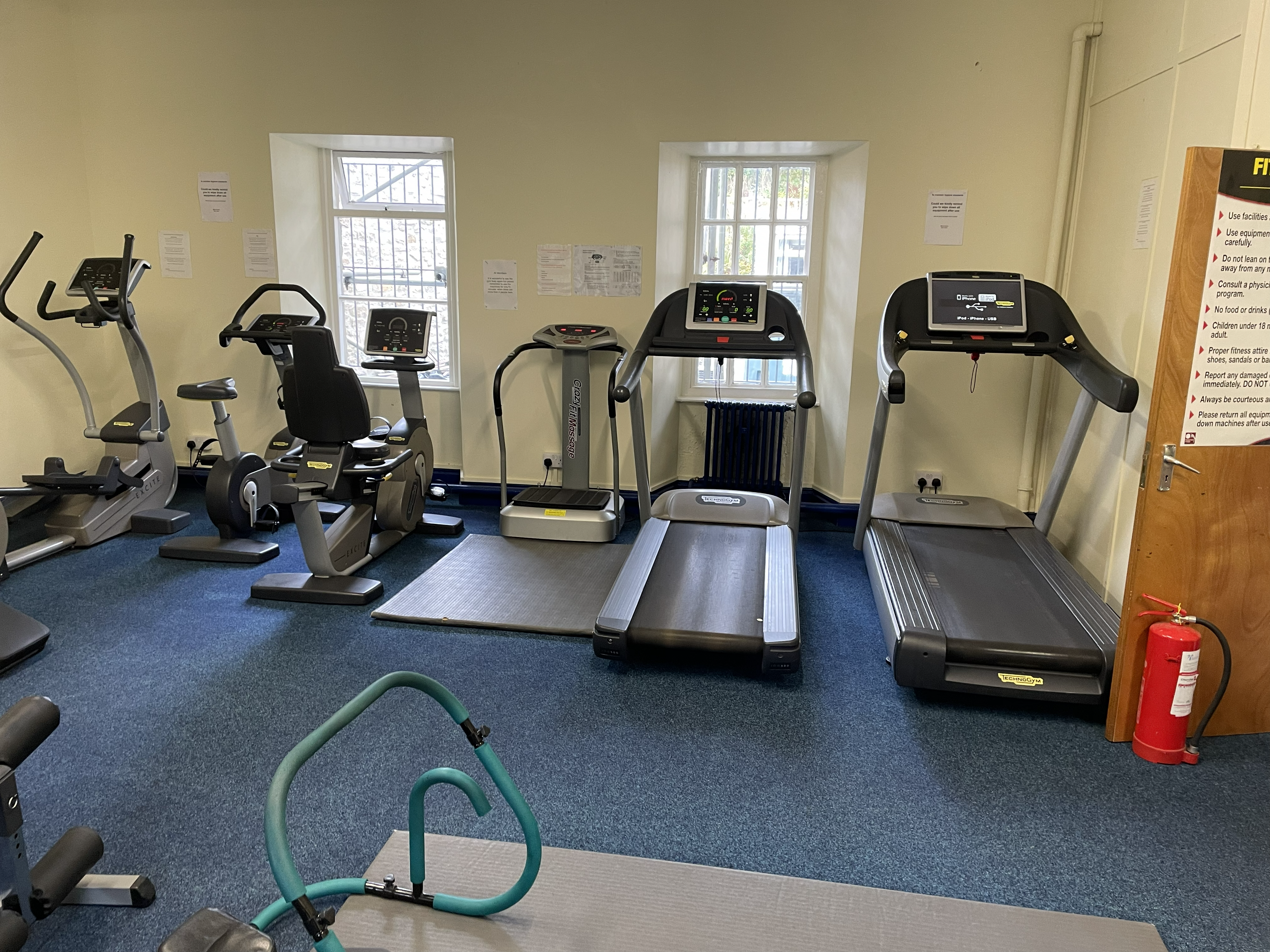 Cardio machines in the gym, including treadmills, cross trainer and recumbent bikes