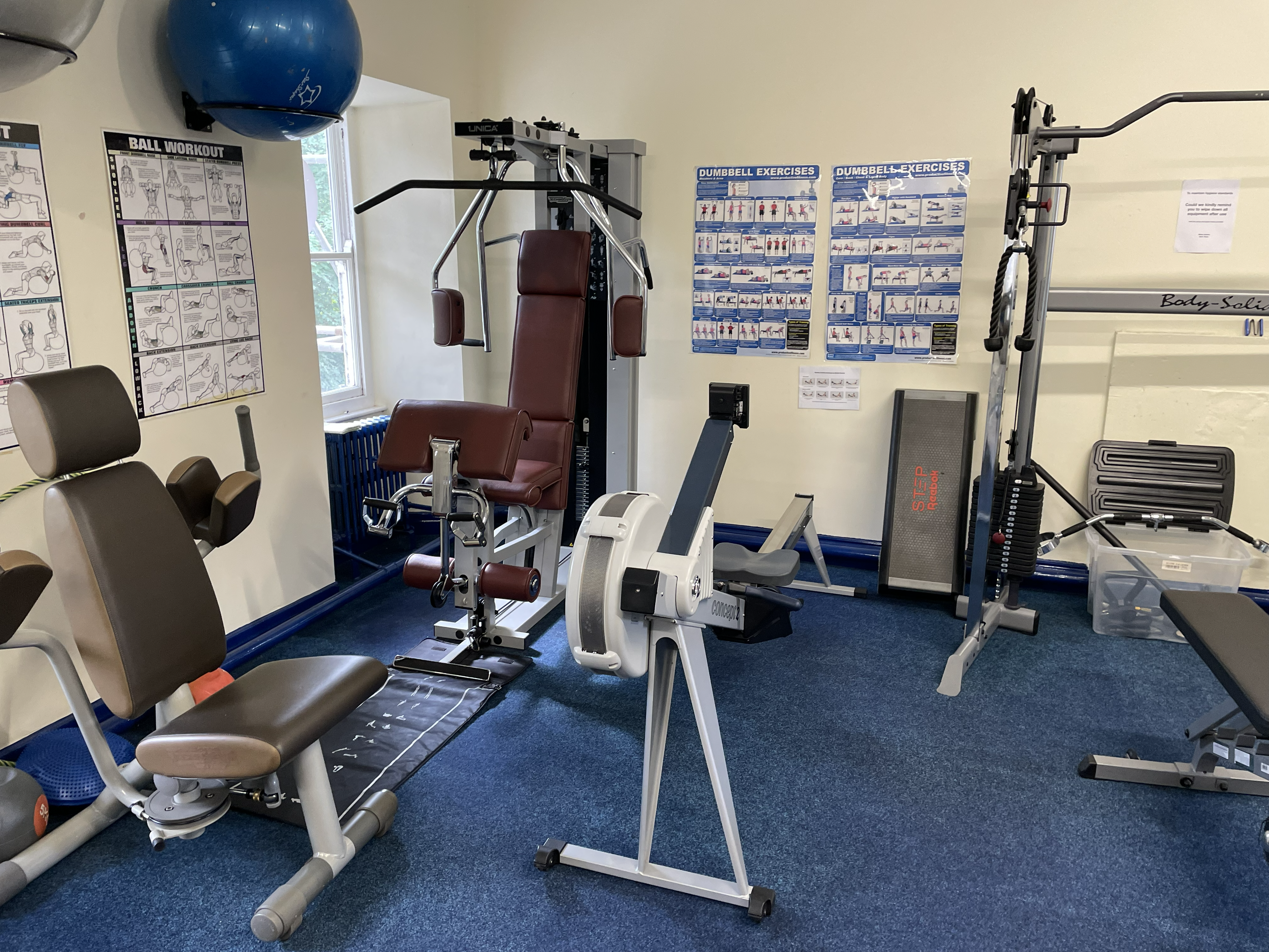 Resistance machines in the gym, including leg press and back extension